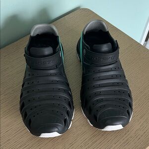 Crosskix, not CROCS Black and White Men's Athletic Shoes
